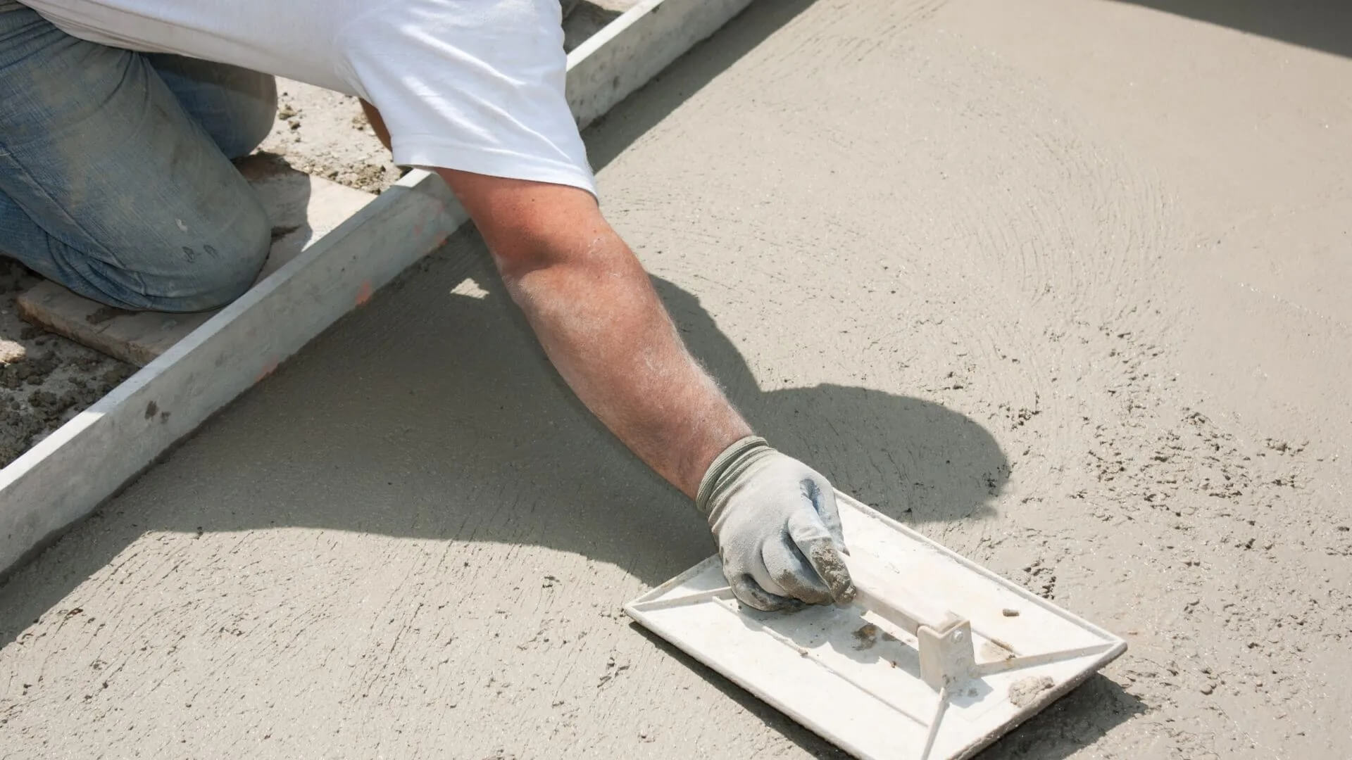 Mason building a screed coat cement_Victoria Concrete and Paving